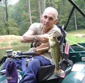Chip and a bass he caught at Ken Pellicano's pond